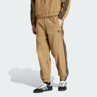 Sportovní kalhoty Adicolor Woven Firebird