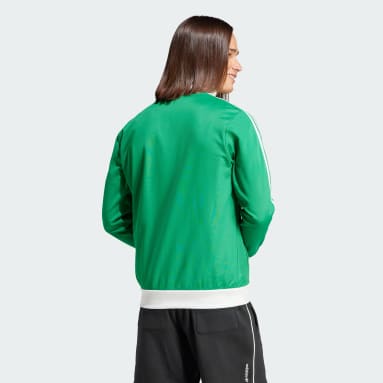 Green adidas tracksuit top new arrivals