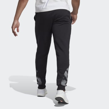 Pantalon imprimé en polaire Nature noir Hommes Sportswear