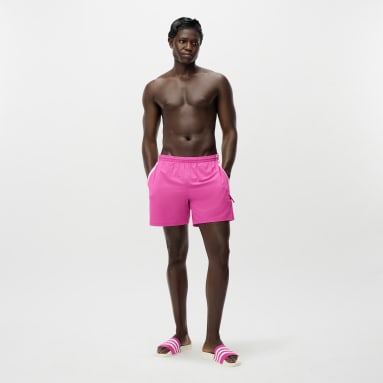 Men wearing pink 2025 shorts