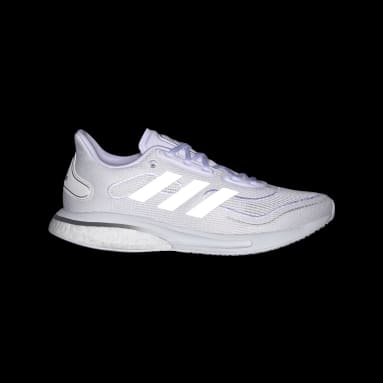 Women Running White Supernova Shoes