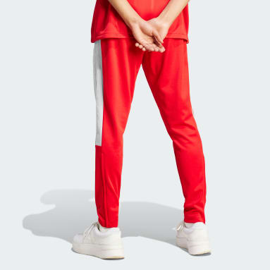 Muži Sportswear červená Kalhoty Tiro