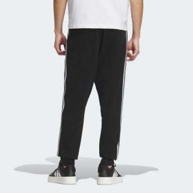 エッセンシャルズ プラス レギュラーフィット スリーストライプス フレンチテリー カフパンツ