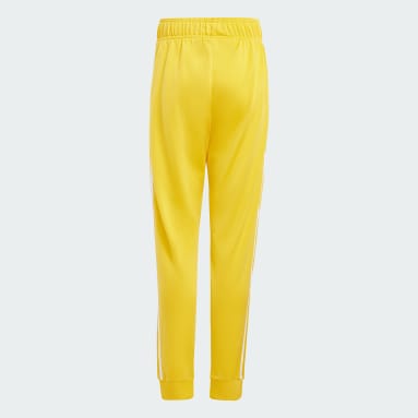 Pantaloni adidas shop bambino giallo