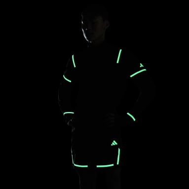 Heren Hardlopen zwart X-City Reflect At Night Longsleeve met Halflange Rits