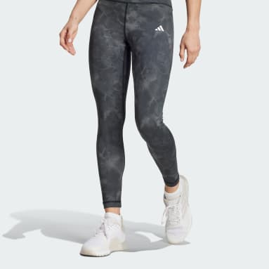 adidas Sportswear ESSENTIALS ANIMAL PRINT - Leggings - Trousers