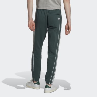 Muži Originals zelená Sportovní kalhoty adidas Rekive