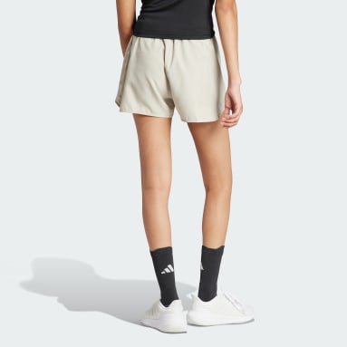 Women Running Beige RUN IT SHORT