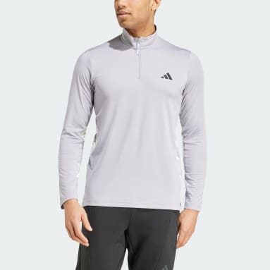 Polo de entrenamiento de manga larga Essentials Camo con cuarto de cremallera