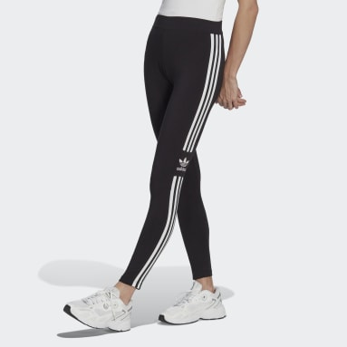 Women’s size small adidas leggings with white stripe halfway down the leg.