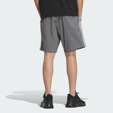 エッセンシャルズ プラス ルーズフィット スリーストライプス ウーブンショーツ