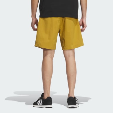 エッセンシャルズ プラス ルーズフィット スリーストライプス ウーブンショーツ