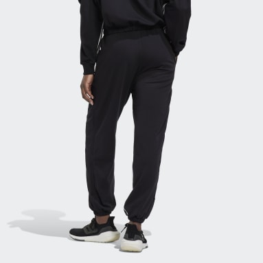 Ženy Sportswear černá Kalhoty Hyperglam 3-Stripes Oversized Cuffed with Side Zippers
