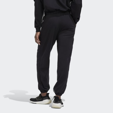 Pantalon sportswear oversize à 3 bandes avec zips latéraux et chevilles resserrées Hyperglam Noir Femmes Sportswear