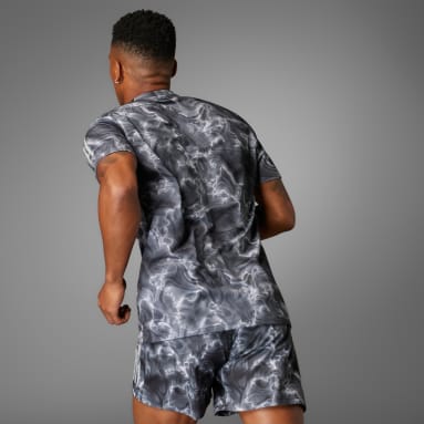 Polo Own the Run Estampado Blanco Hombre Running