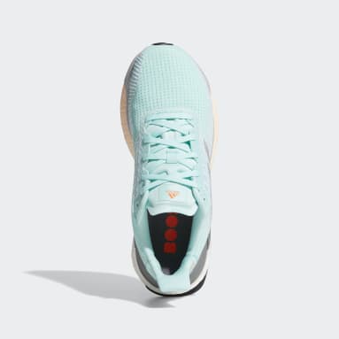 mint green running shoes