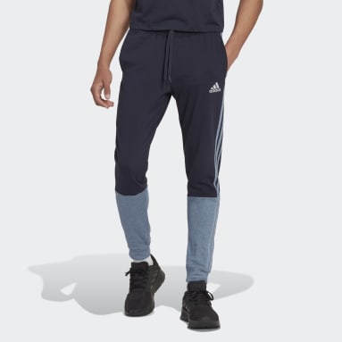 Muži Sportswear modrá Tepláky Essentials Mélange French Terry