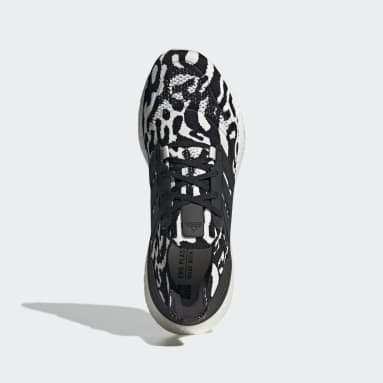 black adidas cow print