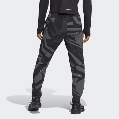 Calça Own the Run Seasonal Preto Homem Running