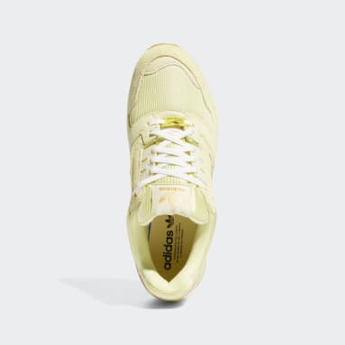 Santo enlace Dramaturgo Tenis Amarillos Hombre | adidas México