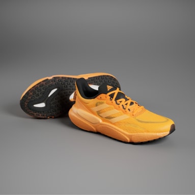 Men Running Orange Solarboost 5 Shoes