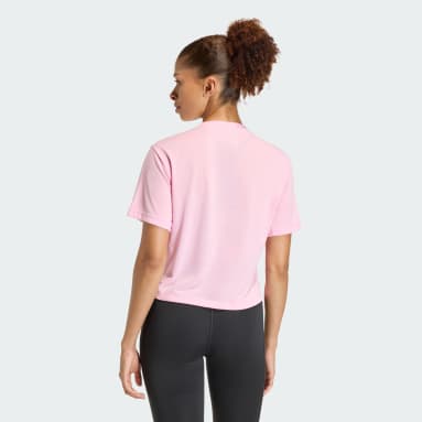 Camiseta de performance com o logotipo grande da treinando Essentials