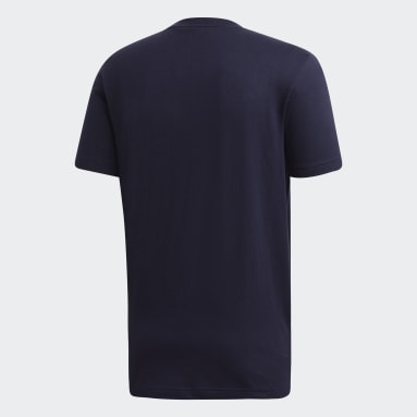 Polera Must Haves Badge of Sport Azul Hombre Lifestyle