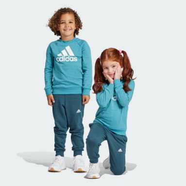 Conjunto Essentials Logo Fleece Terry Turquesa Niño Sportswear