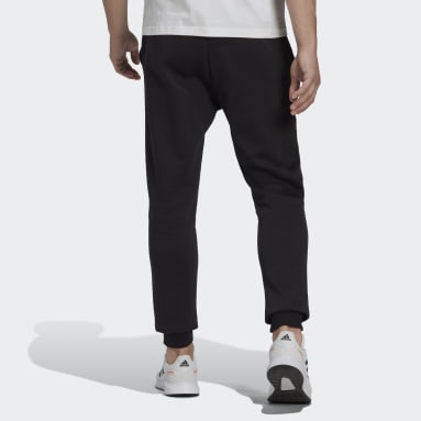 Muži Sportswear černá Kalhoty Essentials Fleece Regular Tapered