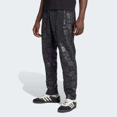 Pantalón deportivo de corte regular con estampado integral de monogramas