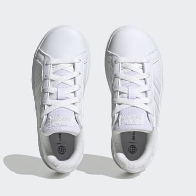 Zapatillas deportivas infantil de piel Adidas en color blanco con