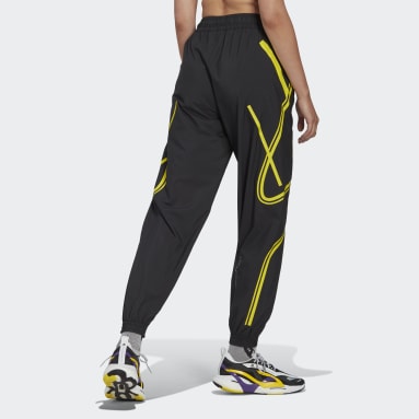 Mujer Ropa de Ropa deportiva de gimnasio y entrenamiento de Pantalones de chándal y joggers Pantalones Deportivos Truepace de adidas By Stella McCartney de color Negro 