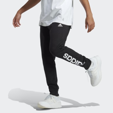 Pantalon en molleton fuselé à logo Essentials Noir Hommes Sportswear
