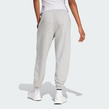 Pantalón Essentials Linear Felpa Francesa Puños Ajustados