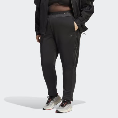 Ženy Sportswear černá Sportovní kalhoty Tiro Suit-Up Advanced (plus size)