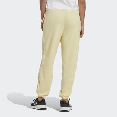 Pants Hyperglam 3 Franjas Holgados Puño Ajustado con Cierres Laterales Amarillo Mujer Sportswear