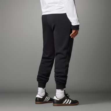 Pantalón Essentials Trefoil Manchester United Negro Hombre Fútbol