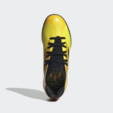 Zapatos de Fútbol X Speedflow. Messi.3 Pasto Sintético Dorado Niño Fútbol