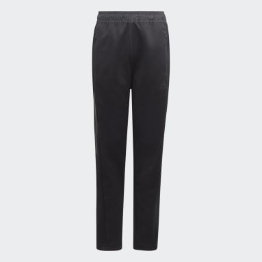 Chlapci Sportswear čierna Tepláky Tiro Suit-Up Woven