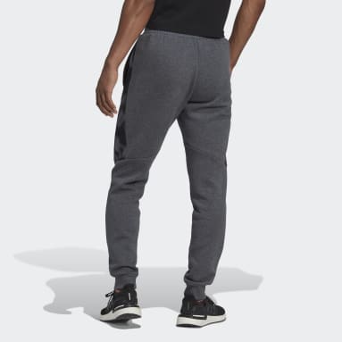 Männer Sportswear Essentials Camo Print Fleece Hose Grau