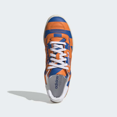 black and orange adidas trainers
