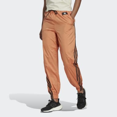 The Sporty Pants Trend That Will Rule this Spring Working Out Not  Required  Striped wide leg trousers Striped wide leg pants Sporty pants