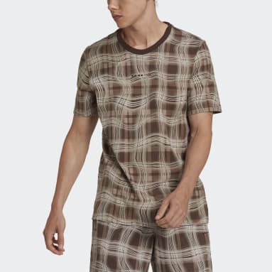 Remera Manga Corta Reveal Allover Print Marrón Hombre Originals