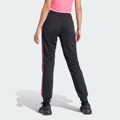 Pantalón Deportivo Essentials 3 Rayas Tejido Tricot con Animal Print y Pierna Cónica