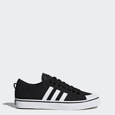 Adidas black nizza trainers store