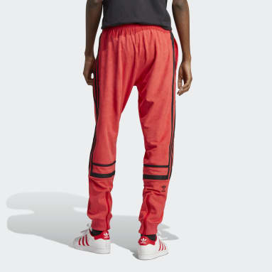 Muži Originals červená Sportovní kalhoty Adicolor Classics Plush