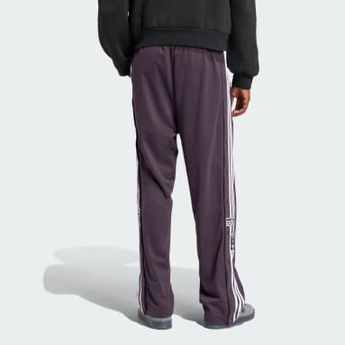 Black adidas pants with purple stripes hot sale