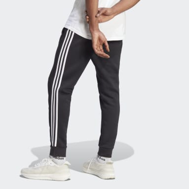 Muži Sportswear čierna Tepláky Essentials Fleece 3-Stripes Tapered Cuff