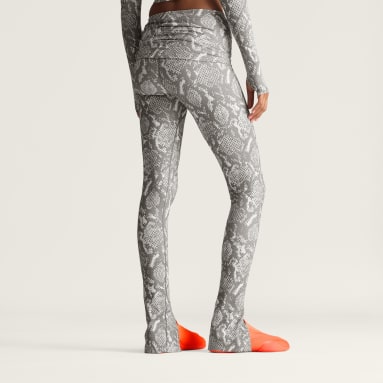 กางเกงเทรนนิงรัดรูปโรลท็อปผ่าชายพิมพ์ลาย adidas by Stella McCartney