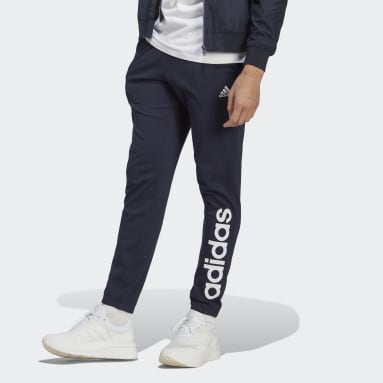 Muži Sportswear modrá Tepláky Essentials Single Jersey Tapered Elasticized Cuff Logo